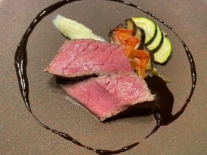 Lean Wagyu beef with seasonal vegetables and red wine sauce